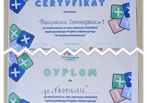 Zdjęcie prezentujące certyfikat dla przedszkola i dla grupy Tropiciele za udział w projekcie.