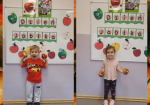 Fotografie dzieci z jabłkami w rączkach na tle tablicy dekoracyjnej z okazji Dnia Jabłka