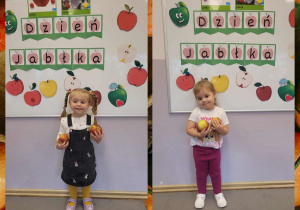 Fotografie dziewczynek z jabłkami w rączkach na tle tablicy dekoracyjnej z okazji Dnia Jabłka