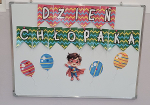 Tablica z napisem Dzień Chłopaka.