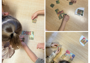 Przedszkolaki wspólnie układają puzzle przy stoliku.