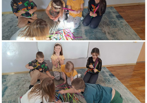 Dzieci wspólnie bawią się kolorowymi drucikami, ćwicząc koncentrację, sprawność manualną i współpracę w grupie.