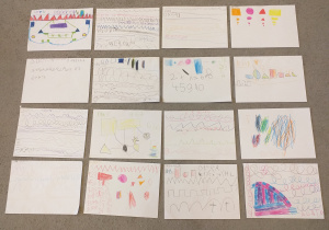 Zdjęcie przedstawia wytwory prac matematycznych dzieci.