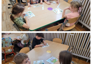 Dzieci z grupy słoneczka siedzą przy stolikach i układają puzzle z obrazkami dinozaurów.